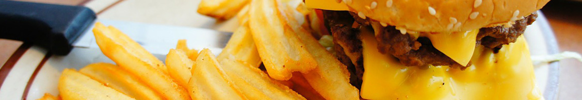 Eating American (Traditional) Burger at Harry Buffalo restaurant in Orlando, FL.